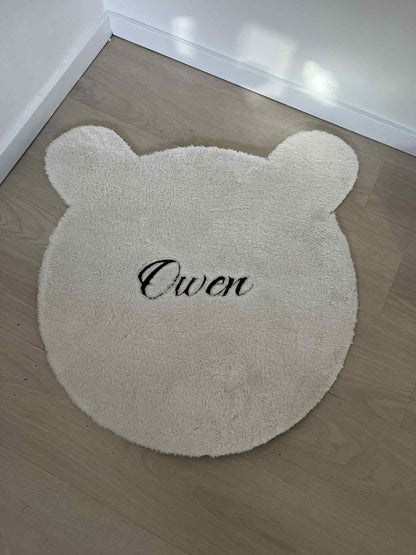 Gepersonaliseerd tapijt met naam geborduurd