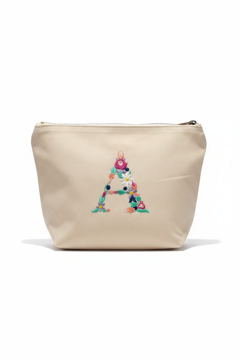 Gepersonaliseerde canvas toilettas met geborduurde bloemenletter