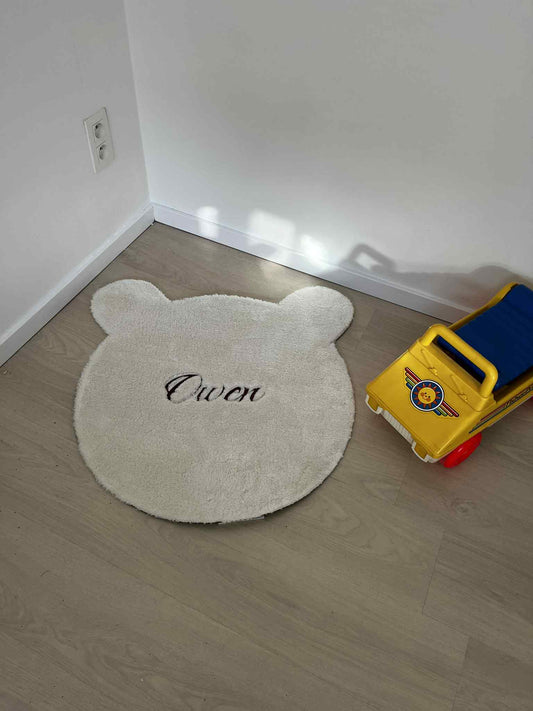 Gepersonaliseerd tapijt met naam geborduurd