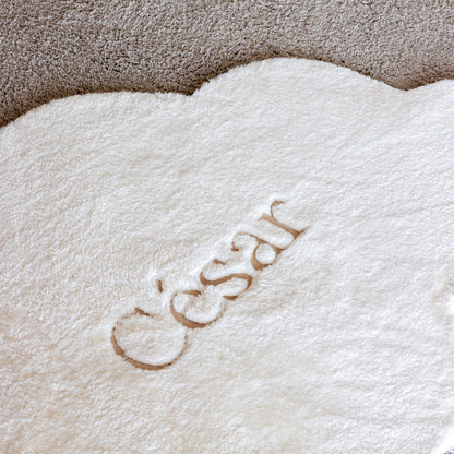 Gepersonaliseerd tapijt met naam geborduurd